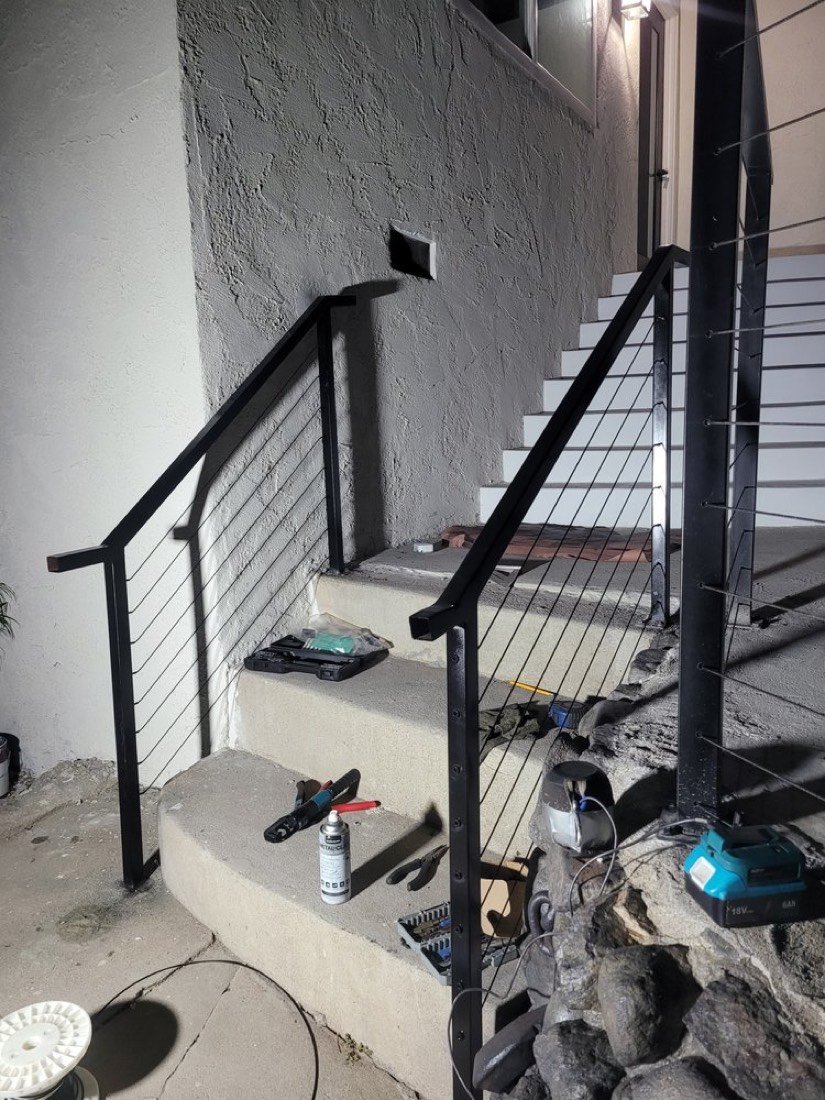 Exterior stainless cable railing on entry steps
