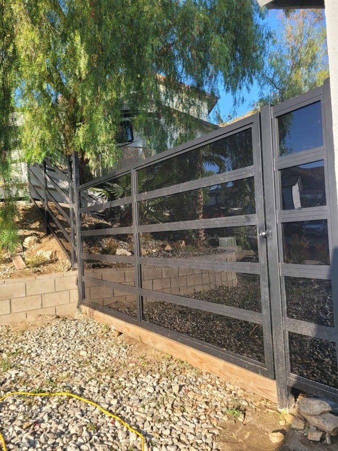 Custom steel gate with glass panels