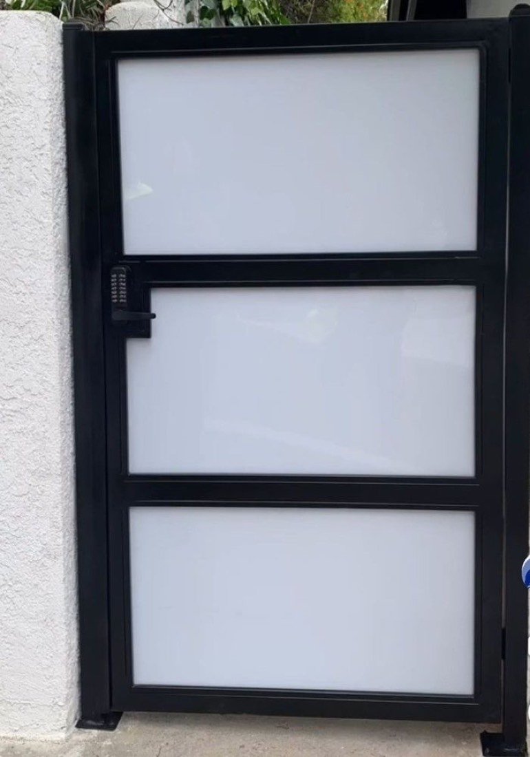 Steel and frosted glass privacy gate