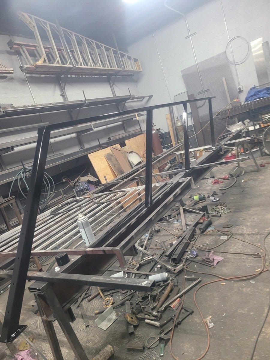 Steel railings under fabrication at the shop