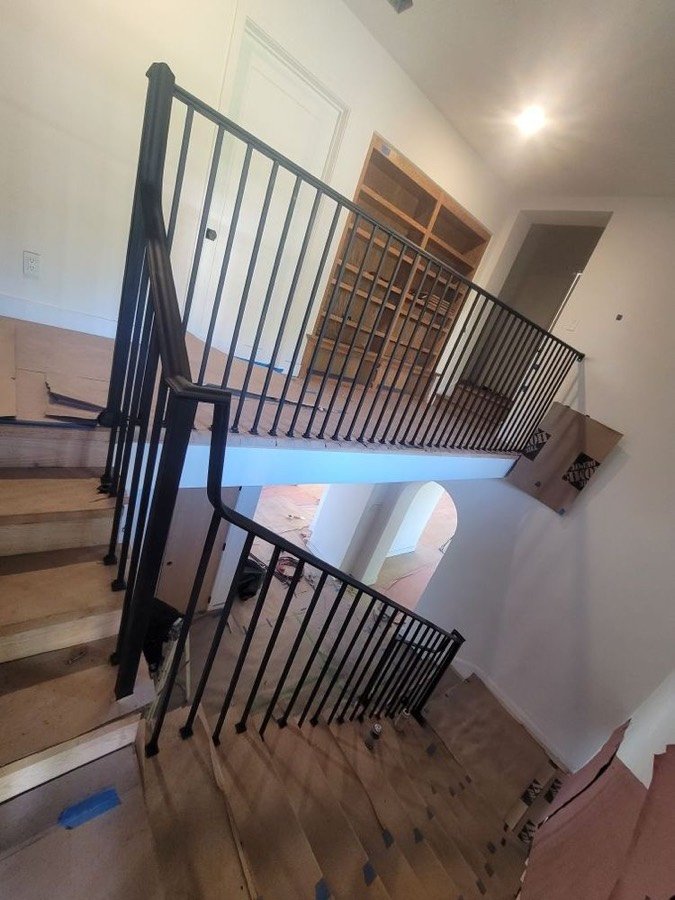 Interior stairwell steel railing