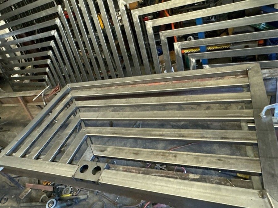 Welded steel frame fabrication in the shop