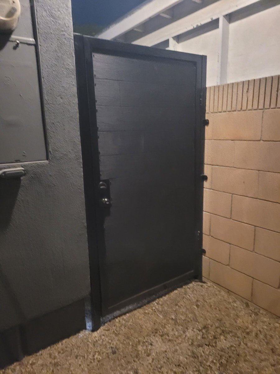 Custom black steel pedestrian gate
